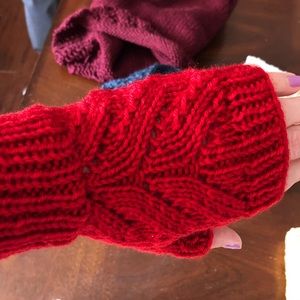 Hand knitted hand warmers